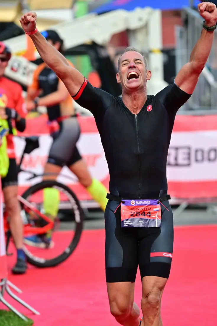 A Horsepower athlete celebrating on the finish line at Challenge Almere-Amsterdam